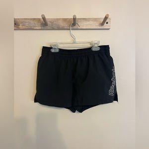 Black Reebok running shorts